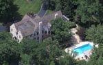 Top view of residential home with pool